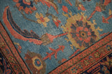 Antique Mahal rug with abrashed sky blue field, gold Herati pattern, and brick red floral border.