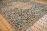 Distressed antique Hamadan rug with worn indigo, sand, and pale coffee brown patterns.