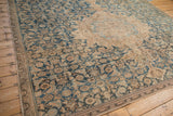 Geometric border of the antique Hamadan rug in beige and charcoal, with visible even wear.
