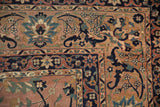 Antique Kerman rug corner with serrated palmettes, expressive arabesques in navy and dusty rose.
