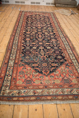 Antique Malayer runner with Herati allover pattern in navy, blush, and beige.
