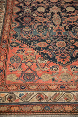 Herati pattern detail on antique Malayer runner with rich navy, dusty blush, and beige.