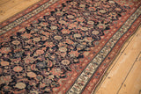 Hand knotted Antique Malayer rug detail: Herati design in dark navy, dusty blush border.