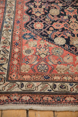 Antique Malayer rug with cream fringe and intricate dusty blush, navy, beige Herati borders.