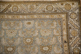 Distressed Kurdish Hamadan runner corner: muted olive, silver, ivory Herati field and serrated border.