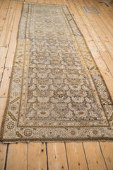 Vintage Hamadan rug with textural short fringe, secured end, and serrated border.