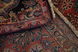 Mohajeran Sarouk carpet showing lush floral pile, fringed edge, and tight reverse weave.