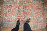 A personal view of a distressed vintage Bijar rug's textured pile.