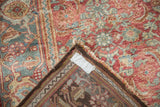 Hand-knotted foundation and repaired corner of a vintage distressed Persian Bijar rug.