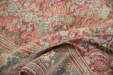 The soft, glossy wool pile and Herati motif of a vintage Persian Bijar rug.