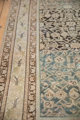 Distressed Malayer runner featuring time-softened Herati field and muted curvilinear blossom border.