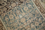 Distressed antique Malayer runner: geometric Herati pattern with dusty teal and beige abrashes.