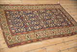 Antique Caucasian rug detail showing Kufic main border and Koneghand allover design.