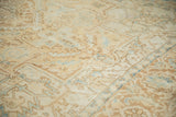 Close view of the even wear down to the knot heads on a distressed Persian Heriz rug.