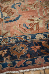 Detail of an antique Lilihan's distressed texture, showing the navy border and copper field.