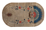 Antique Art Deco Fetti-Li rug, ivory field, unidirectional peacock palmette, blue vines, rose flowers, late 1920s.