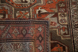 Close-up of the overcast stitch and handwoven back of a vintage Kurdish rug runner.