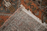 Hand knotted foundation, distressed pile, secured side cord, and fringe of a vintage Hamadan rug.