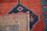 The hand-knotted foundation, side selvage, and wool pile of an antique Bakshaish runner.
