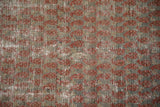 Antique distressed Malayer rug detail, showing faded red, slate grey, and visible foundation.