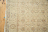 Corner of vintage Turkish Sivas rug, soft gold interlaced palmettes and stylized border.