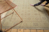 Close-up of vintage Sivas rug's soft, hand-knotted pile featuring interlaced palmettes.