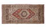 Vintage Oushak runner with a rusty bronze lozenge field and grey-ivory geometric medallion, 3'9
