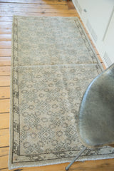 Vintage Oushak runner featuring an allover geometric design in tone-on-tone silver, charcoal, and beige.