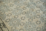 Textural detail of the vintage Oushak runner's repeating silver, charcoal, and beige pattern.