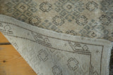 Vintage Oushak runner, revealing its hand-knotted foundation and subtle beige, silver, charcoal pattern.