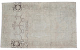 Light-toned vintage Oushak rug with contrasting geometric design, 4'4