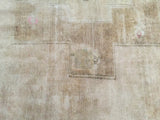 High sheen textured pile of the vintage Oushak, with beige, bronze geometric patterns and pink.