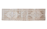 Vintage Oushak runner, soft geometric medallion pattern in light beige and brown. 2'7