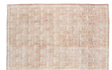 Vintage Turkish Oushak carpet with a light peach rose field and repeating bird motif, 6x9 feet.