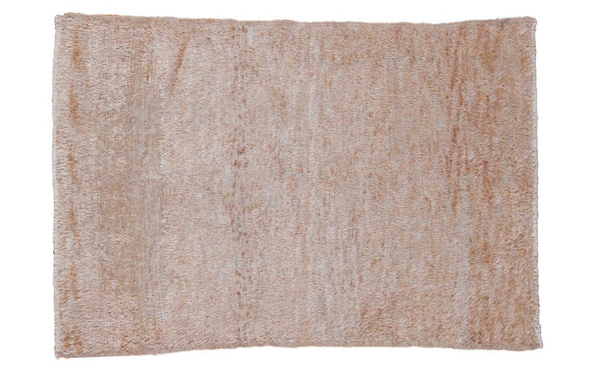Vintage Tulu rug with a shaggy beige pile and mixed texture, 2'7" x 3'9".