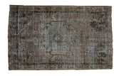 Distressed vintage Oushak rug with faded bronze, charcoal, grey medallion, 3'9
