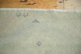 Hand-knotted foundation of the Vintage Oushak rug, showing blanched ivory and charcoal patterns.