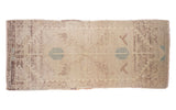 Vintage Oushak runner with geometric serrated leaf medallion, blanched ivory, silver, ice blue.