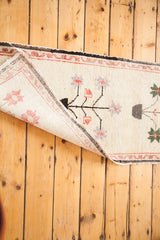 Hand-knotted foundation of Vintage Oushak runner with pale ivory and whimsical tree of life.