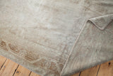 Plush vintage Oushak pile in platinum and silver over subtle abrash, revealing its hand-knotted foundation.