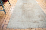 Plush vintage Oushak carpet edge showing subtle medallion and gold-toned abrash.