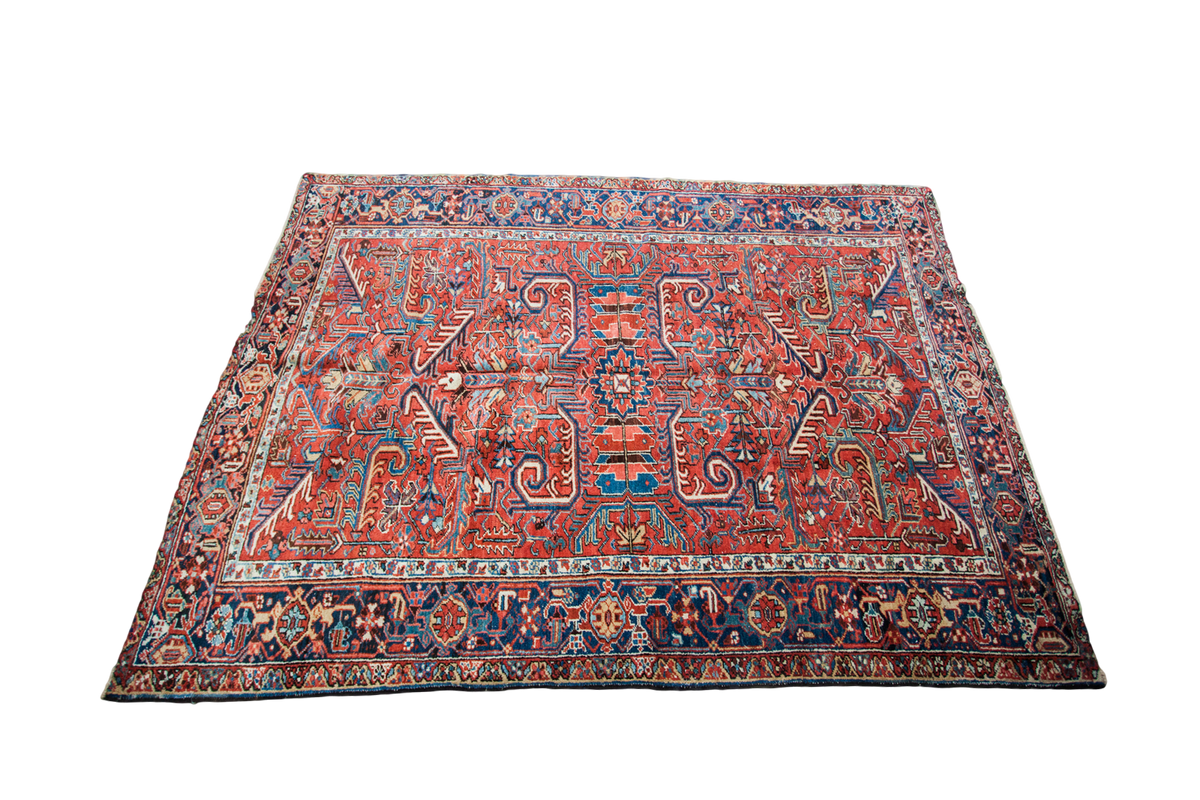 Vintage Heriz carpet, brick red field, navy border, sprawling allover design, gem tones, 7'5" x 10'3".