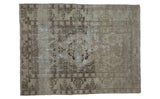 Distressed vintage Oushak rug with faded tone-on-tone patterns and central medallion, 4' x 5'3