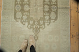 Turkish Oushak hand-knotted rug's light ivory and seafoam green tonal medallion design.