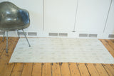 Distressed Oushak rug runner with sun-faded blanched look and subtle cypress tree motif.