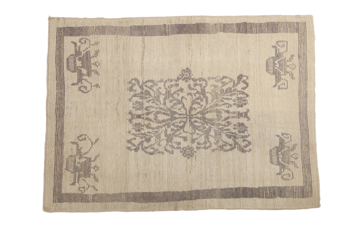 Unique vintage Tulu rug, ivory with oxidized silver curvilinear medallion and striped border.