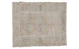 Faded vintage Oushak square rug with sandy beige and sea foam green tones.