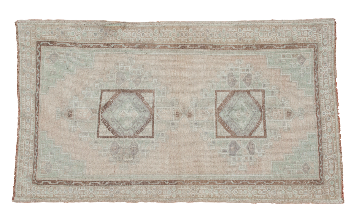 Vintage Oushak rug: peach field, pale mint spandrels, double geometric medallions, 3'7