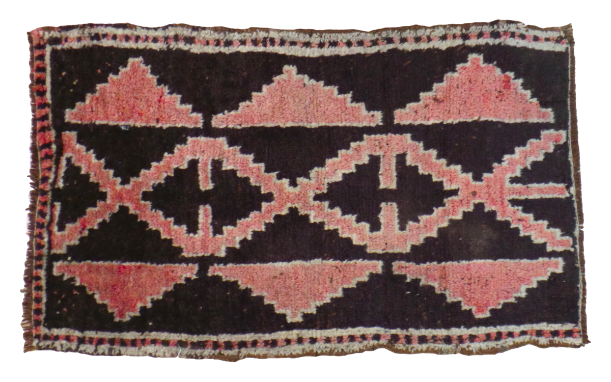Vintage Kars rug with grapefruit red stepped-geometric lattice on a deep dark ground, 1'9" x 2'10".