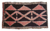 Vintage Kars rug with grapefruit red stepped-geometric lattice on a deep dark ground, 1'9